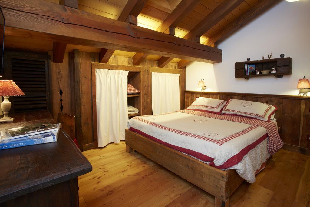 Le Bibelot Apartments Nus Δωμάτιο φωτογραφία